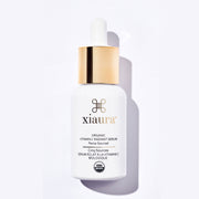 Xiaura organic vitamin C serum bottle on a white background