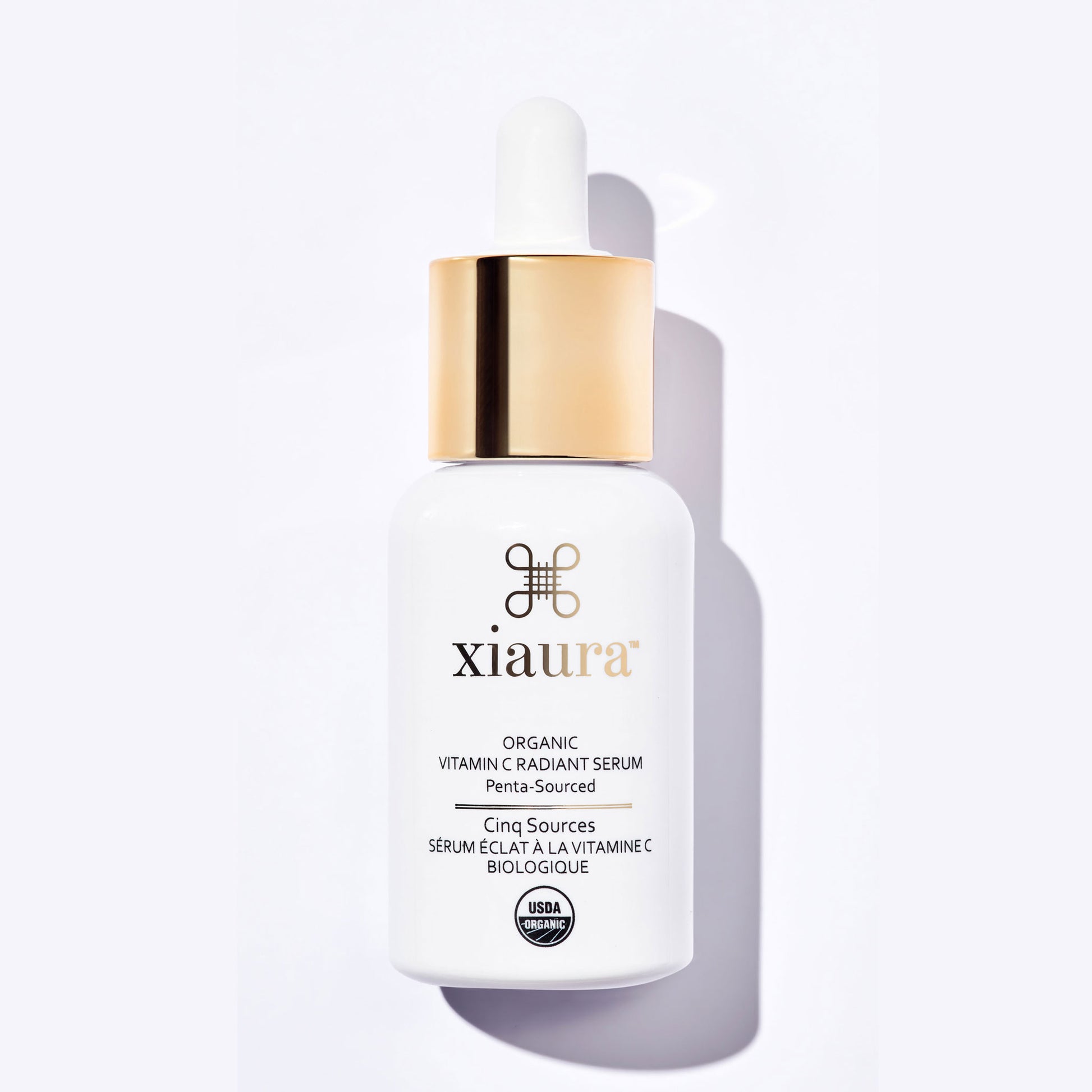 Xiaura organic vitamin C serum bottle on a white background